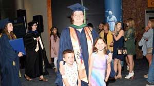 Stephanie Prescott at graduation with her family.