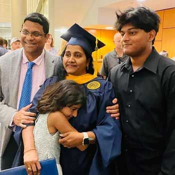 Supraja Guppi with her family at graduation.