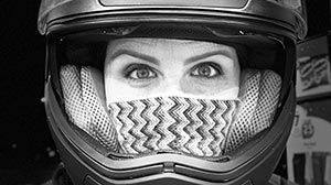 Angie wearing a racing helmet.