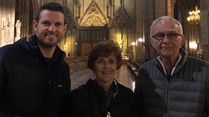 Scott with his parents in a church.