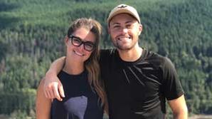 Leo Hunt and his girlfriend posing in nature.