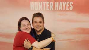Cassandra with her partner at Hunter Hayes.