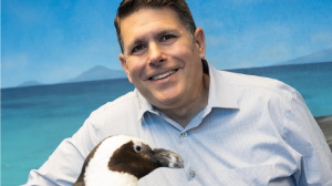 Dan Dipiazzo with a penguin.