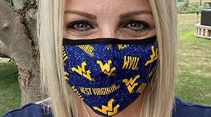 Allison Dagen wearing a WVU mask.